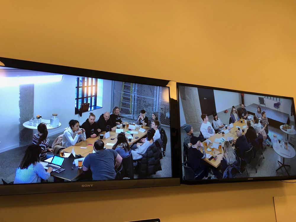 Focus group on two TV screens from an observation room.